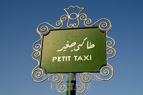 Sign  " Petit Taxi "  at a taxi stand Marrakesh , Morocco , Africa